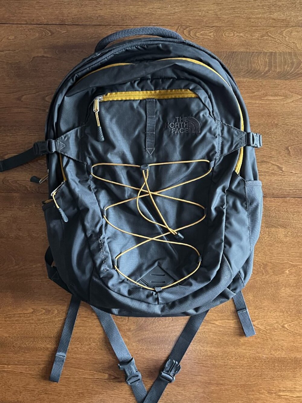 The North Face dark gray and orange Borealis backpack